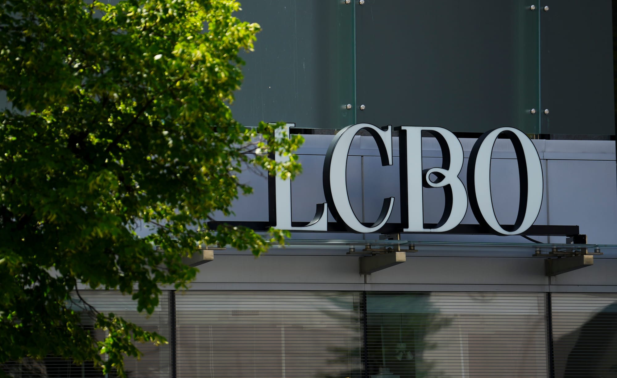 A close shot of the sign above the doors of an LCBO retail store