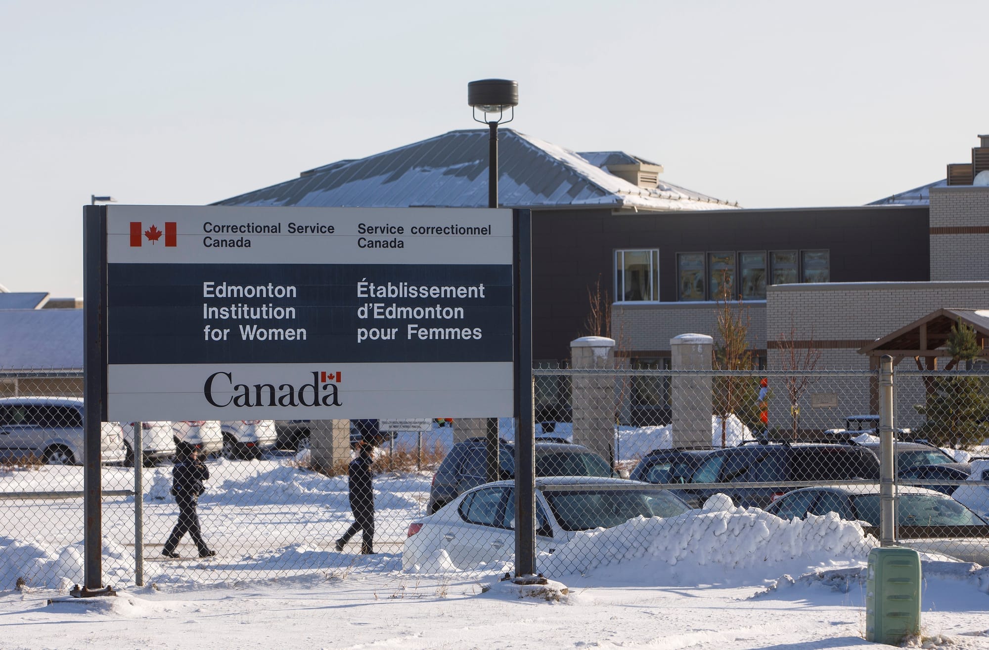 The sign for the Edmonton Institution for Women is shown on a snowy day in front of the prison.