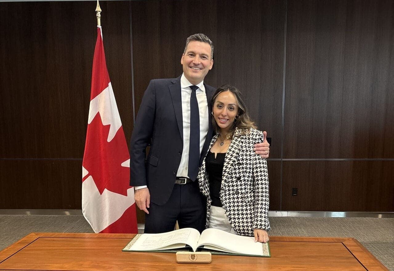 Sharan Kaur and Evan Solomon pose for a photo in Ottawa.