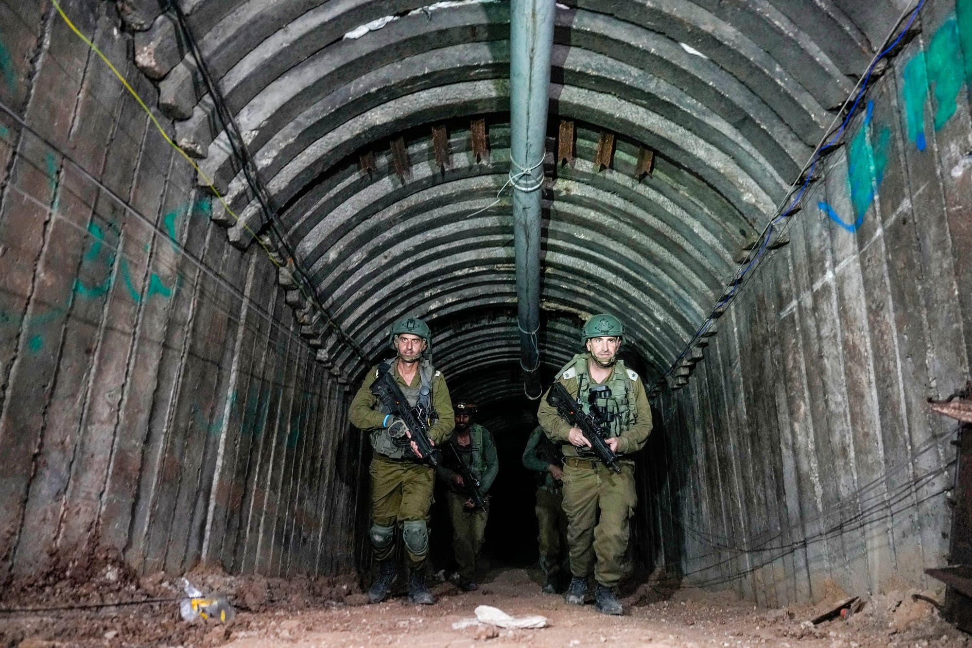 Israeli soldiers are seen in a tunnel that the military says Hamas militants used to attack the Erez crossing in the northern Gaza Strip.