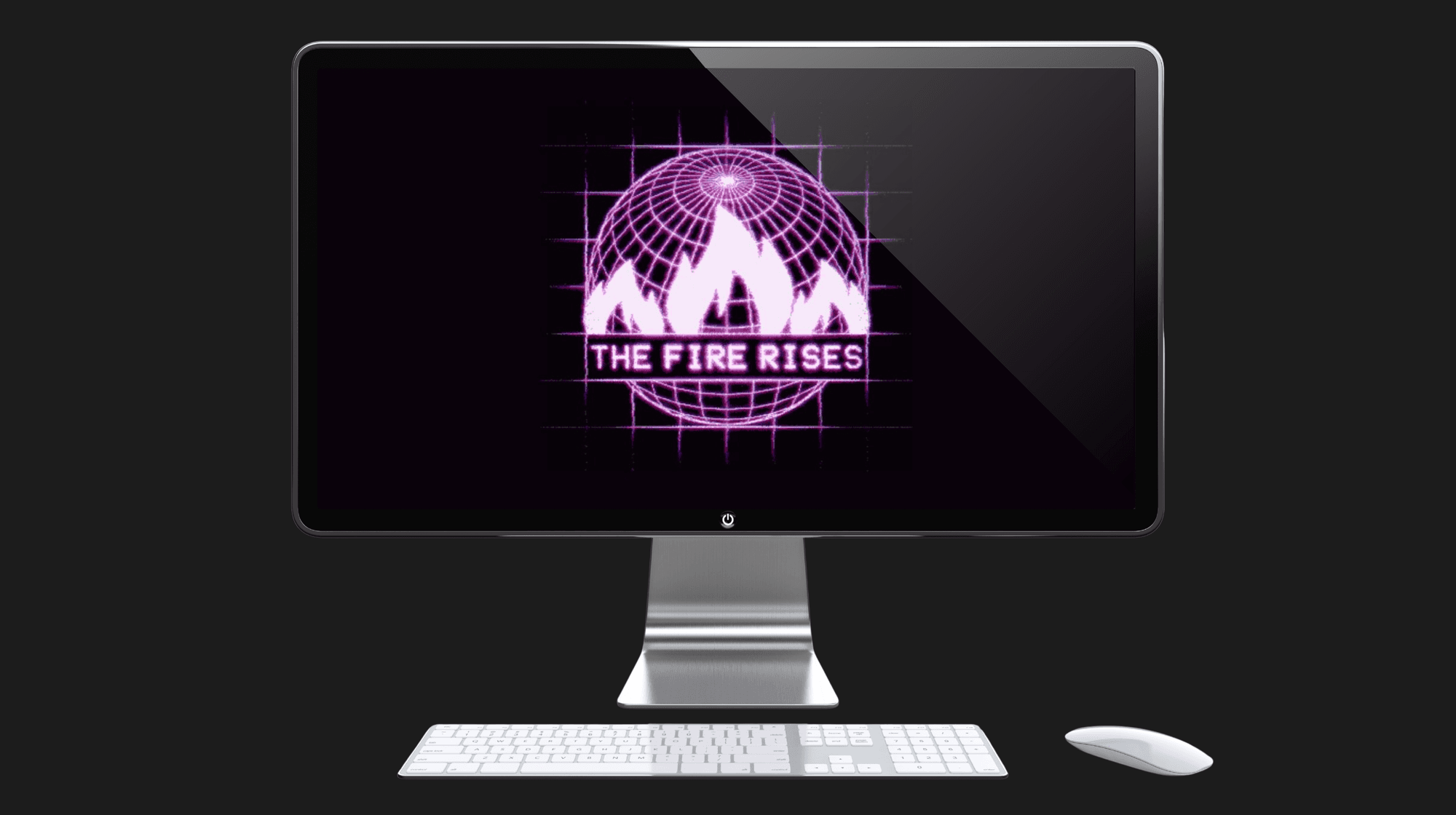 A black and silver computer monitor displays a purple globe with illustrations of flames overtop some text reading "The Fire Rises"