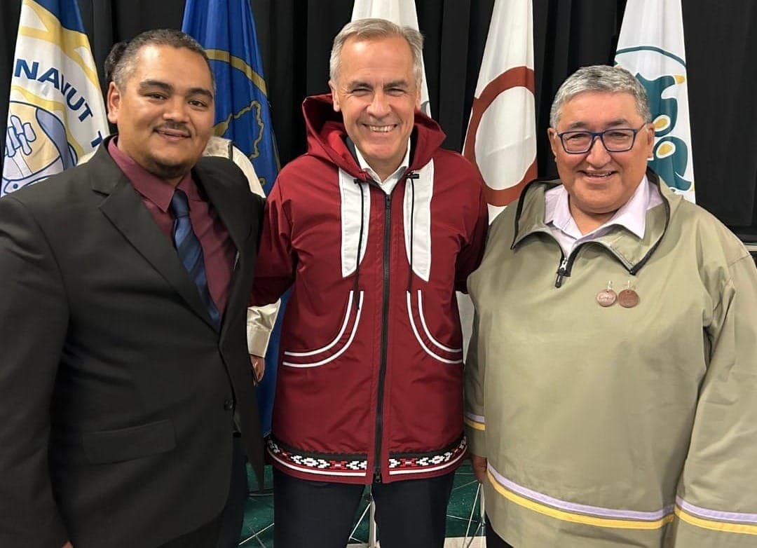 Prime Minister Mark Carney poses with leaders of Nunavut Tunngavik Inc., at a meeting where they reaffirmed commitments to fully implement the Nunavut Agreement.