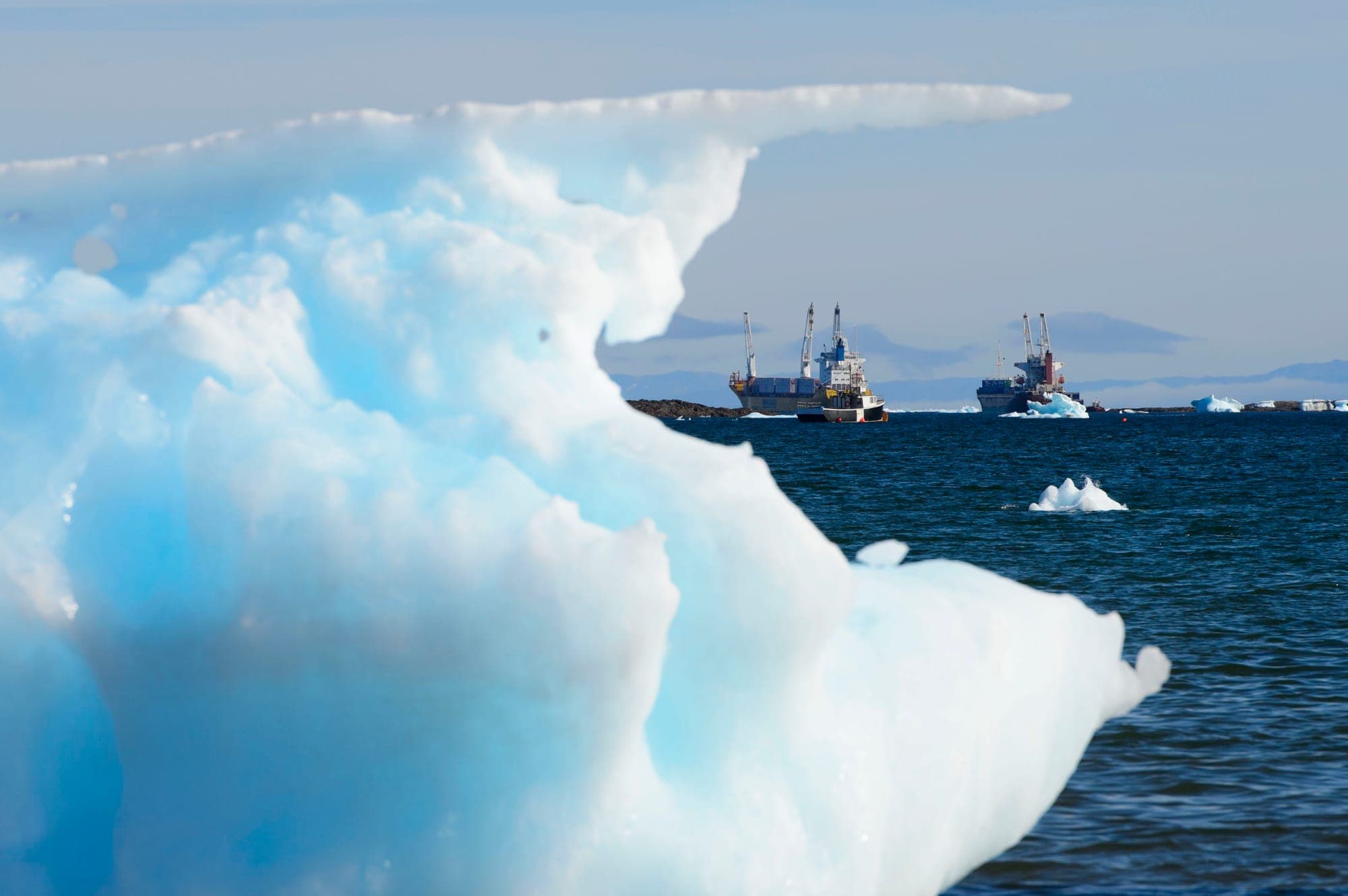Ships are frames by pieces of melting sea ice in Frobisher Bay in Iqaluit, Nunavut.