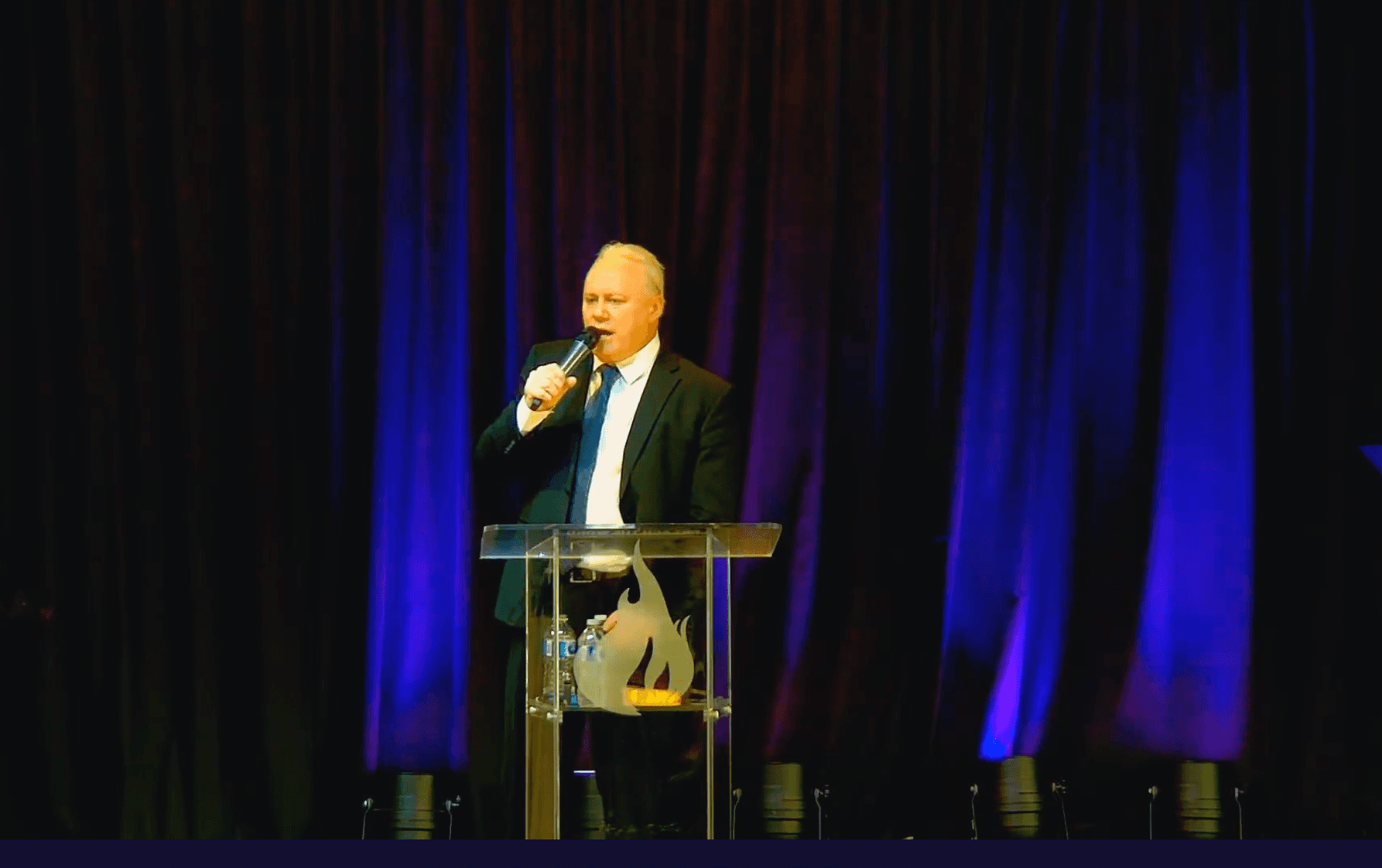 Pastor Beau Zilinski, director of the New Life Pentecostal Church, speaking in Grande Prairie, Alta., in March 2026. (YouTube)