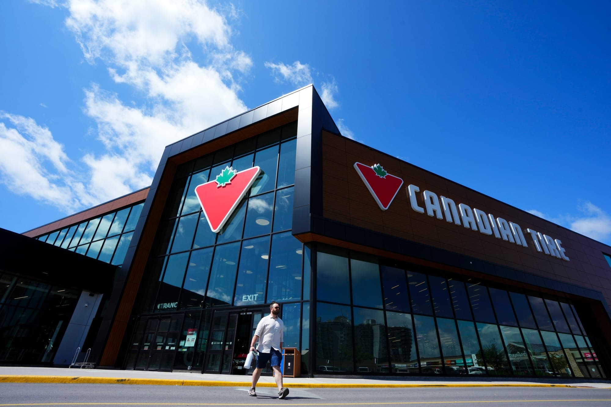 Shoppers come and go from a Canadian Tire store in Ottawa in 2023.