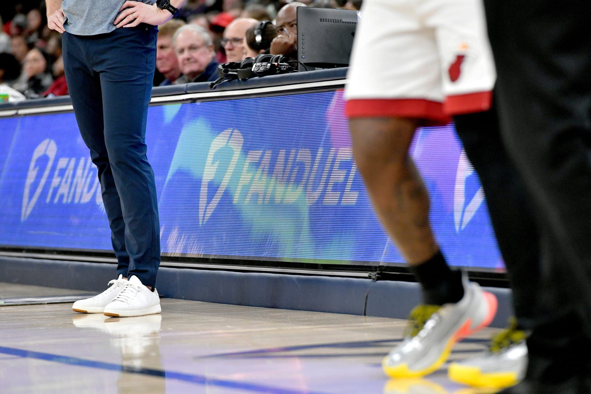 A digital advertisement for the online gambling company FanDuel is displayed in the first half of an NBA basketball game.