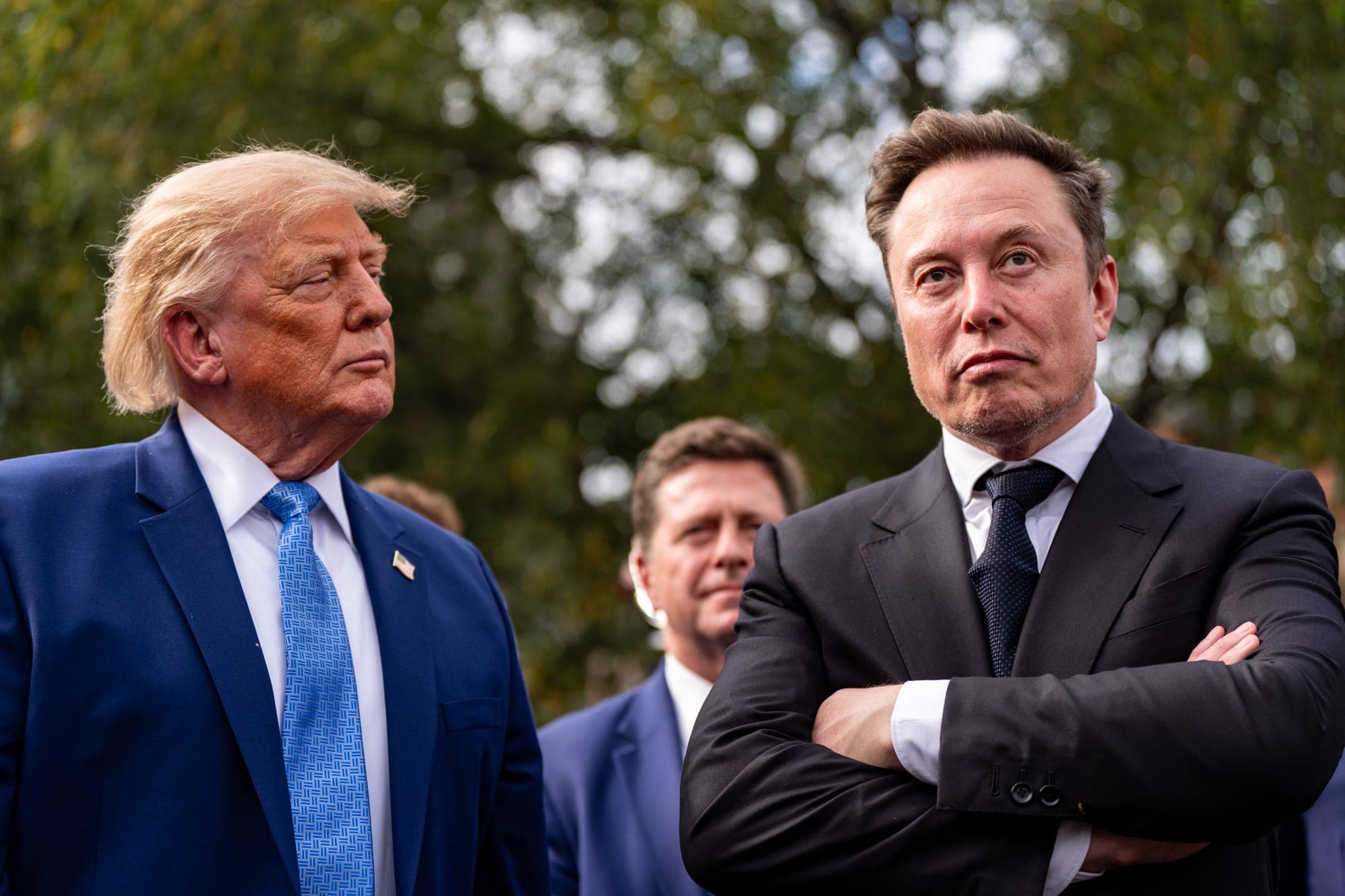 President Donald Trump listens as Elon Musk speaks outside the West Wing of the White House, Tuesday, Sept. 29, 2026, in Washington. (AP Photo/Alex Brandon)
